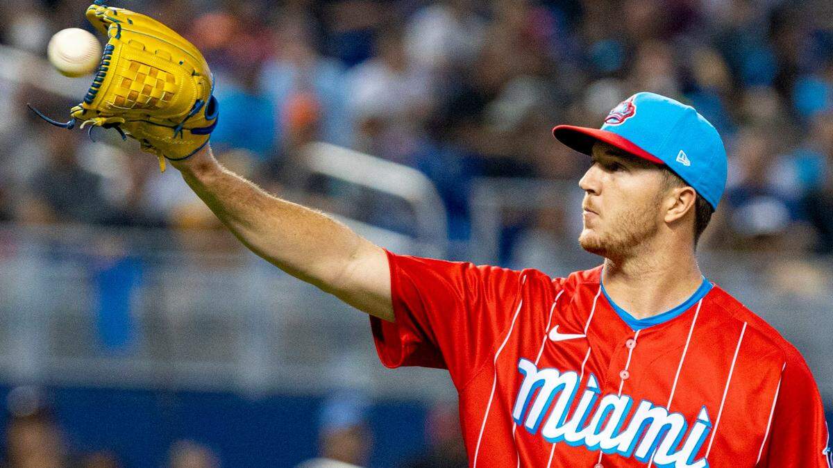 Miami Marlins pitcher Trevor Rogers (28) catches the ball during the first inning of an MLB game against the Atlanta Braves at loanDepot park in the Little Havana neighborhood of Miami, Florida, on Saturday, July 10, 2021.