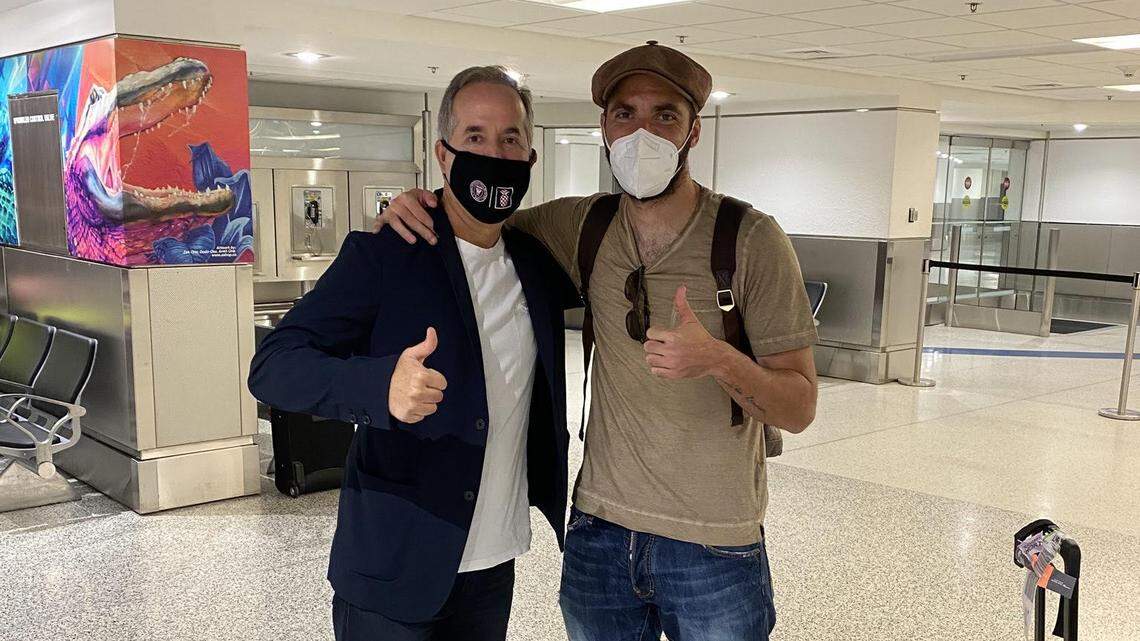 Inter Miami co-owner Jorge Mas greets Argentine forward Gonzalo Higuain at Miami International Airport Sept. 10, 2020. Higuain is leaving Juventus to join Inter Miami.