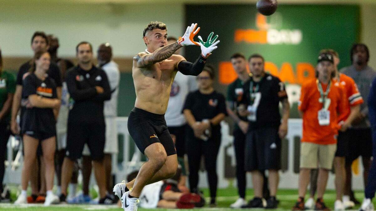 Former Hurricanes wide receiver Xavier Restrepo makes a catch during University of Miami’s Pro Day at Carol Soffer Indoor Practice Facility on Monday, March 24, 2025, in Miami, Florida.