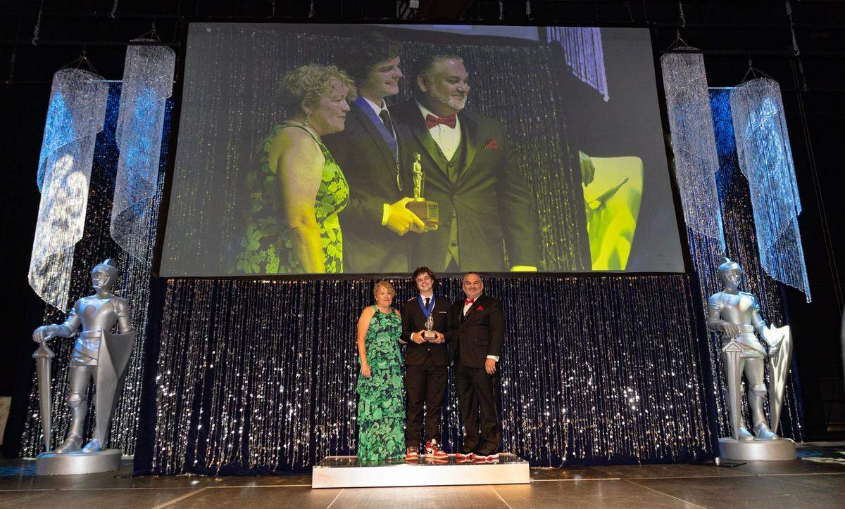 Silver Knight winner Connor Dixon in the Athletics category, from Coral Shores High School is photographed with his award next to Dana Banker Senior Managing Editor and Alex Mena, Executive Editor during the Miami Herald & el Nuevo Herald 67th&nbsp;Silver&nbsp;Knight&nbsp;Award Ceremony at the James L.&nbsp;Knight&nbsp;Center on Wednesday, May 14, 2025, in downtown Miami, Fla.