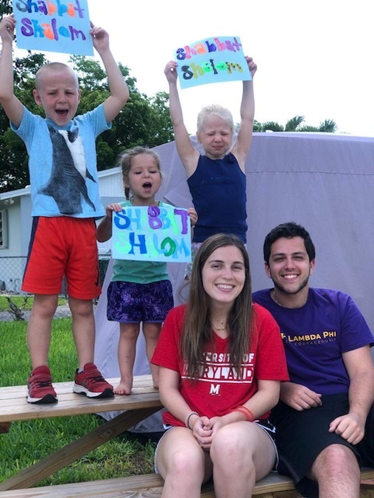 Zachary Tabachnikoff and Lindsey Greenstein ran their own in-home camp. Here they are pictured with Benji, 7, Lena, 5 and Cora, 3.