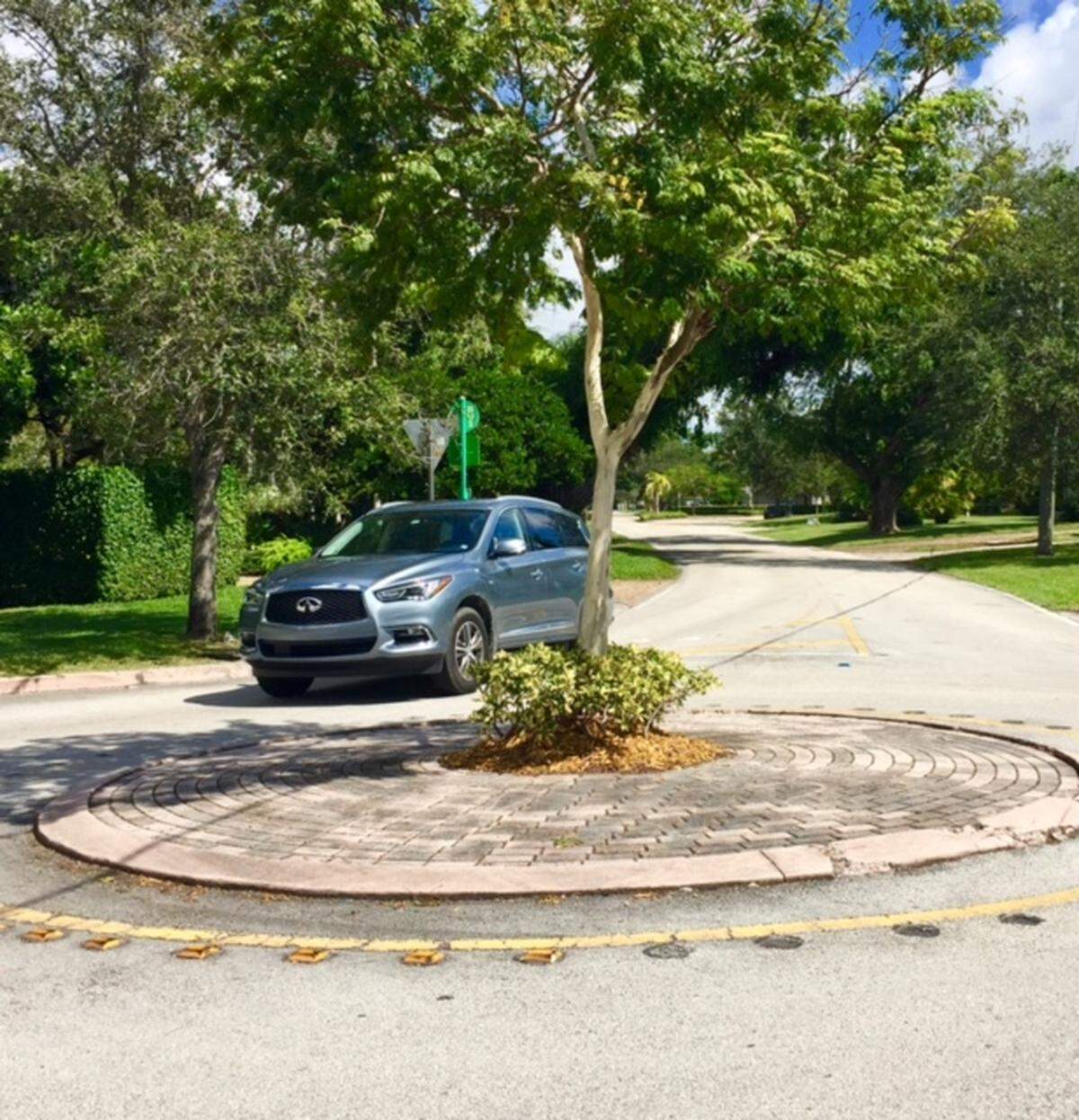 A roundabout or traffic circle in Coral Gables built to slow traffic at a busy intersection.
