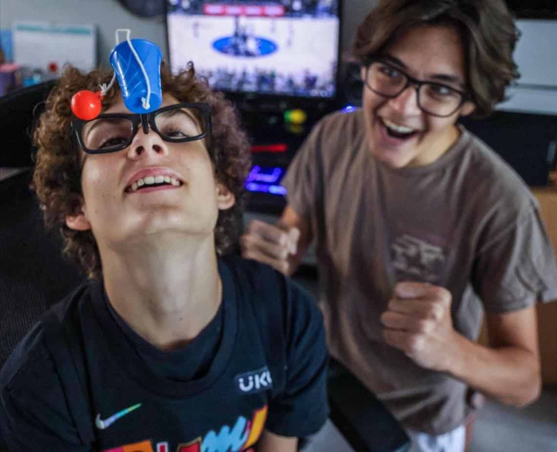 Ryan Zaney and Rocco Palladino demonstrate how to use the Nose Aerobics Basketball Game, the perfect gift for the athlete in your life.