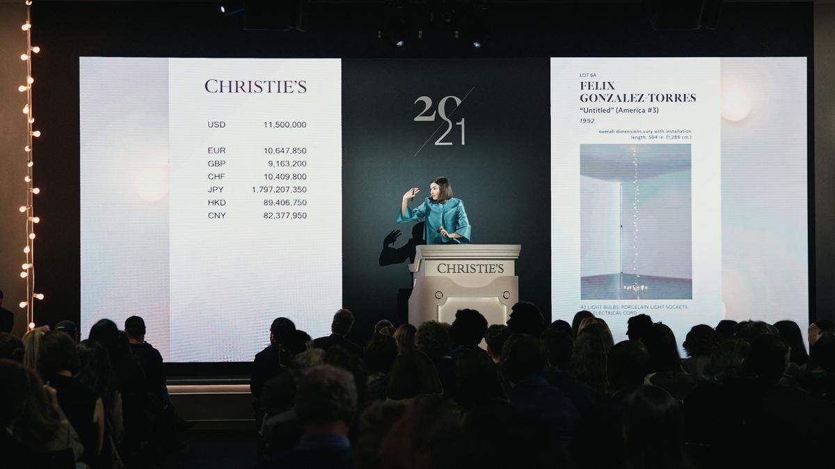 Christie’s auctioneer Georgina Hilton selling “Untitled” (America #3) by Felix Gonzalez-Torres. The fine art auction house is selling works from the collection of the late Miami arts patron Rosa de la Cruz.