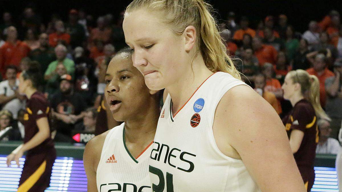 UM Hurricanes Endia Banks (3) comforts Emese Hof (21) after team lost to Arizona State Sun Devils during the second round of NCAA women’s basketball tournament on Sunday, March 24, 2019 at Watsco center in Coral Gables