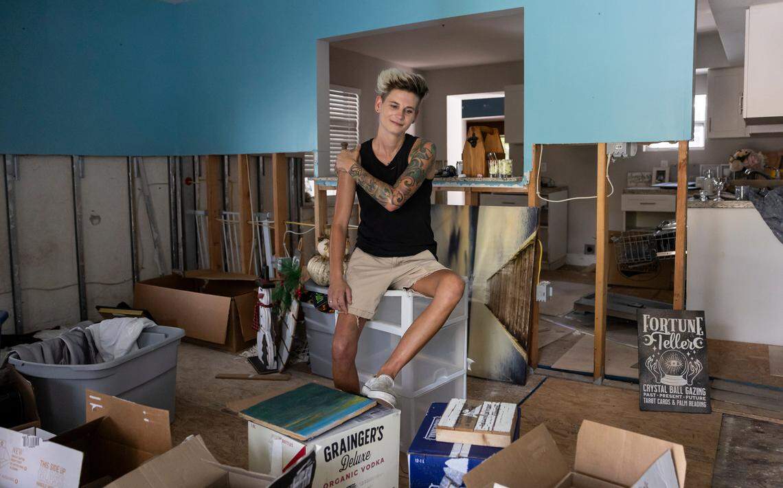 Ashley Bowman surveys the damage in her condemned Fort Lauderdale home. Bowman didn’t realize her home had experienced severe flooding before she purchased it.