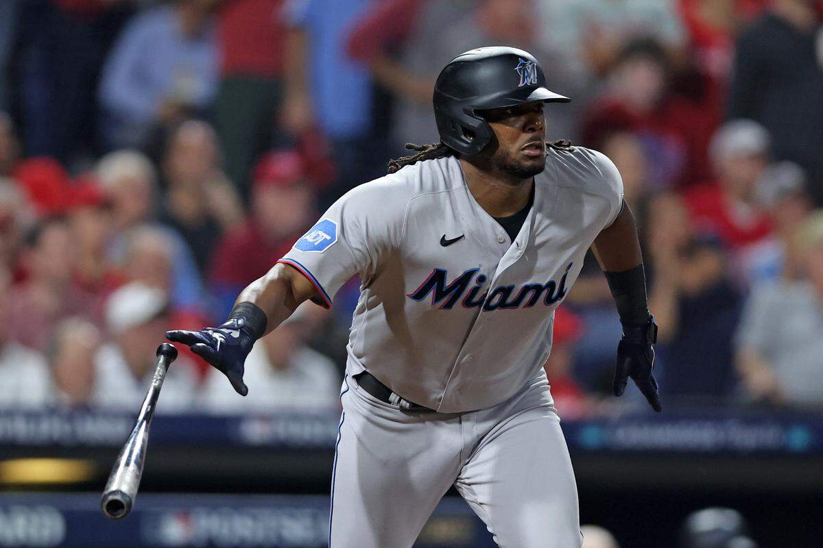Oct 3, 2023; Philadelphia, Pennsylvania, USA; Miami Marlins first baseman Josh Bell (9) hits a double against the Philadelphia Phillies in the seventh inning for game one of the Wildcard series for the 2023 MLB playoffs at Citizens Bank Park.