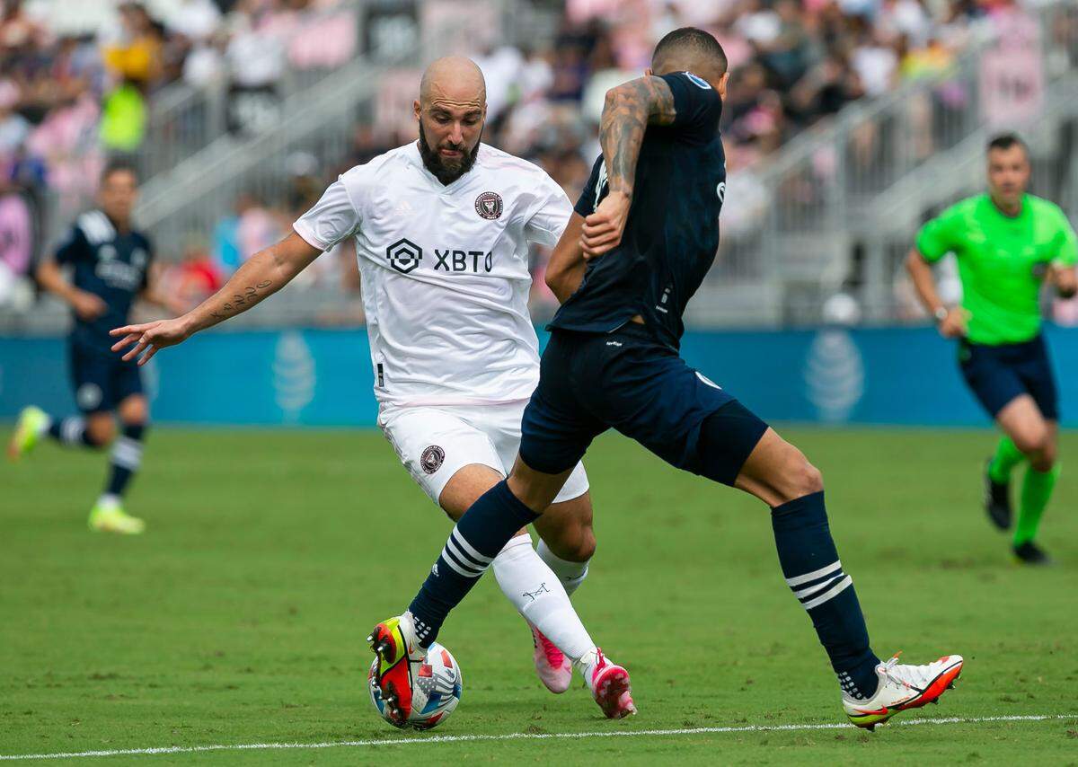 Inter Miami forward Gonzalo Higuain (9) fights for possession of the ball against New York City FC defender Alexander Callens (6) during the first half of their MLS soccer match at DRV PNK Stadium on Saturday, October 30, 2021, in Fort Lauderdale, Florida.