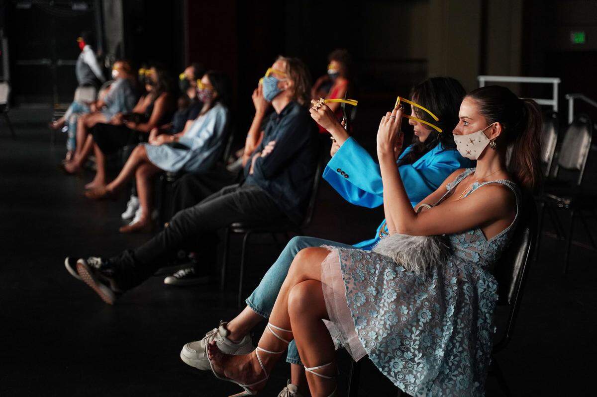 The audience at “Lasting Impressions” wears 3D glasses to watch Impressionist masterpieces come alive.
