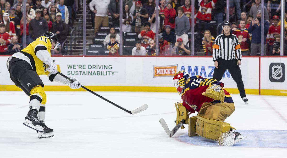 Florida Panthers goaltender Sergei Bobrovsky (72) blocks a shot by Boston Bruins center Casey Mittelstadt (11) in a penalty shootout to win the NHL game at the Amerant Bank Arena on Wednesday, Feb. 4, 2026, in Sunrise, Fla.