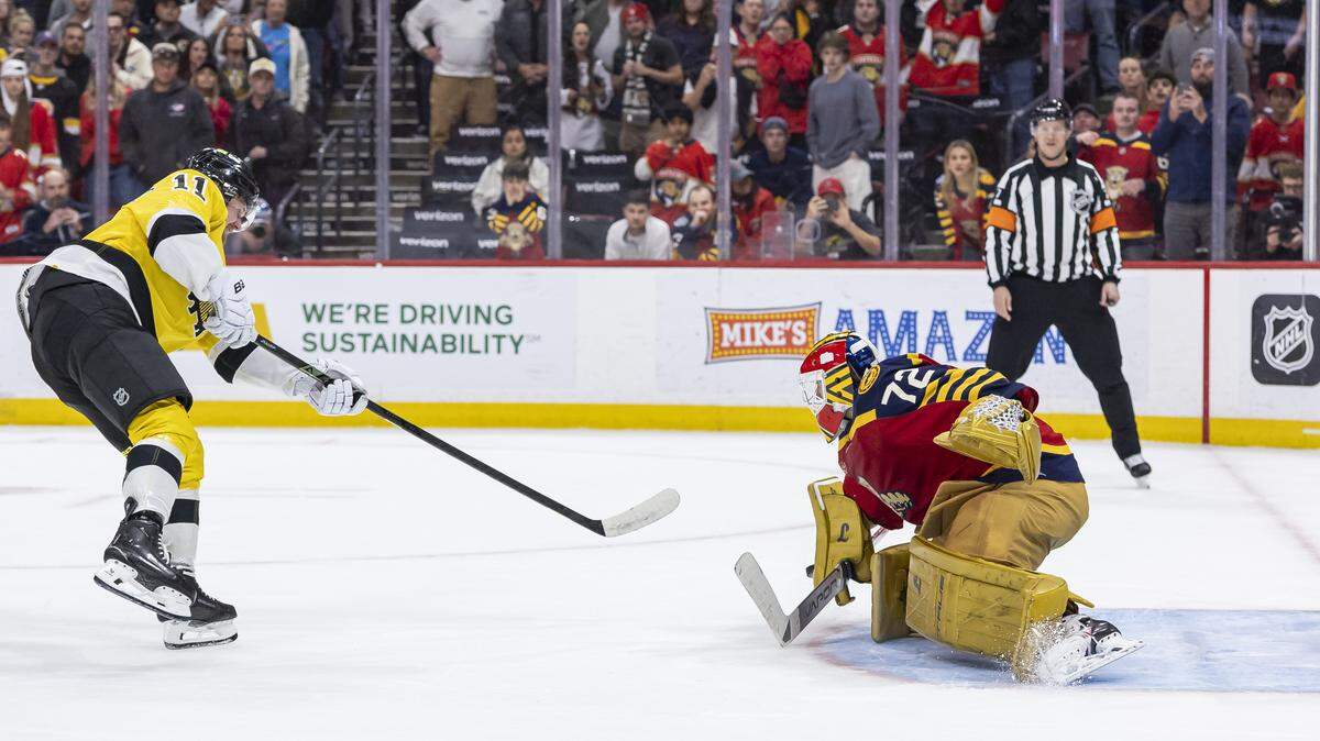 Florida Panthers goaltender Sergei Bobrovsky (72) blocks a shot by Boston Bruins center Casey Mittelstadt (11) in a penalty shootout to win the NHL game at the Amerant Bank Arena on Wednesday, Feb. 4, 2026, in Sunrise, Fla.