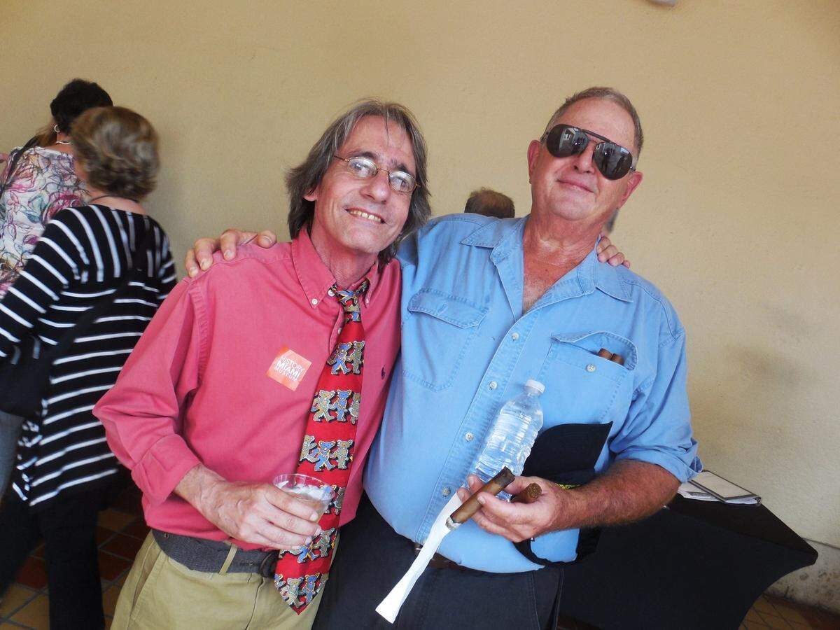 Larry Kahn stands with retired Miami Herald photographer Tim Chapman in 2016.