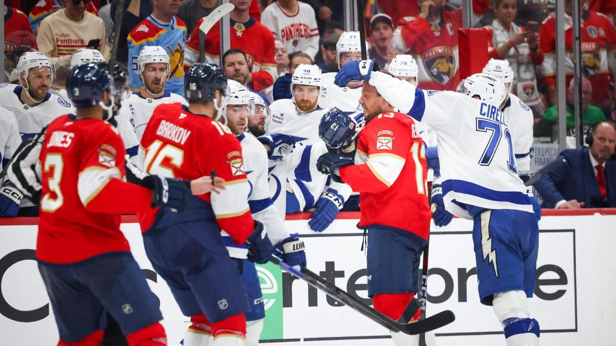 Tampa Bay Lightning center Anthony Cirelli (71) knocks the helmet off of Florida Panthers center Sam Reinhart (13) during the second period of Game 3 of the first-round Stanley Cup playoff series on Saturday, April 26, 2025, at Amerant Bank Arena in Sunrise, Fla.