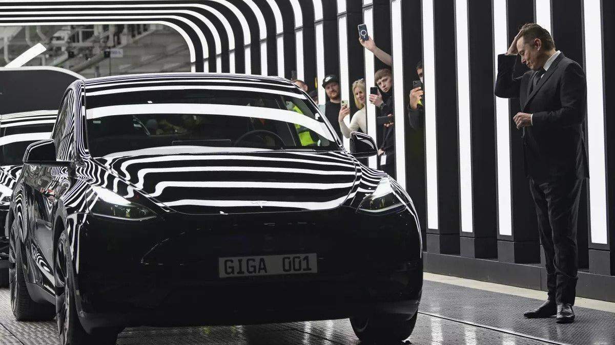 Elon Musk, Tesla CEO, right, at the opening of the Berlin Brandenburg Tesla factory in Gruenheide, Germany in March 2022.