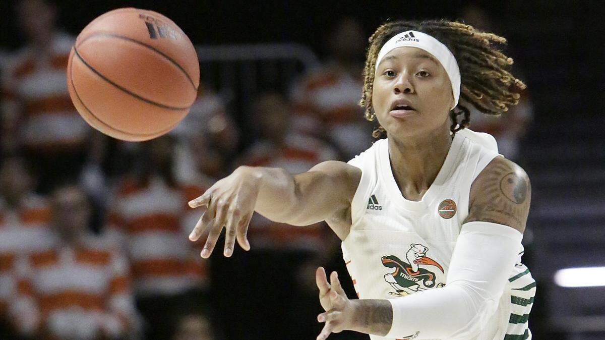 UM Hurricanes’ Taylor Mason (13), shown against FSU in the 2020 season, led Miami with 13 points off the bench in a 67-59 loss against the Seminoles on Feb. 14, 2021.