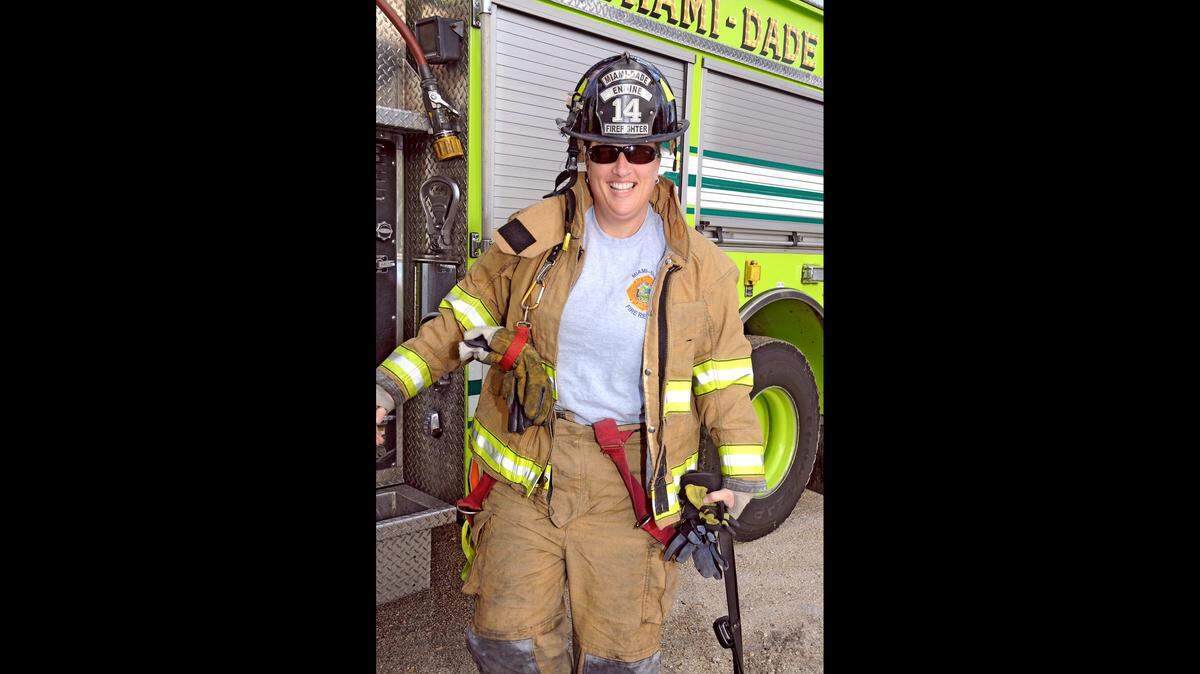 Miami-Dade firefighter Claudine Buzzo on an extricating drill before she was diagnosed with pancreatic cancer.