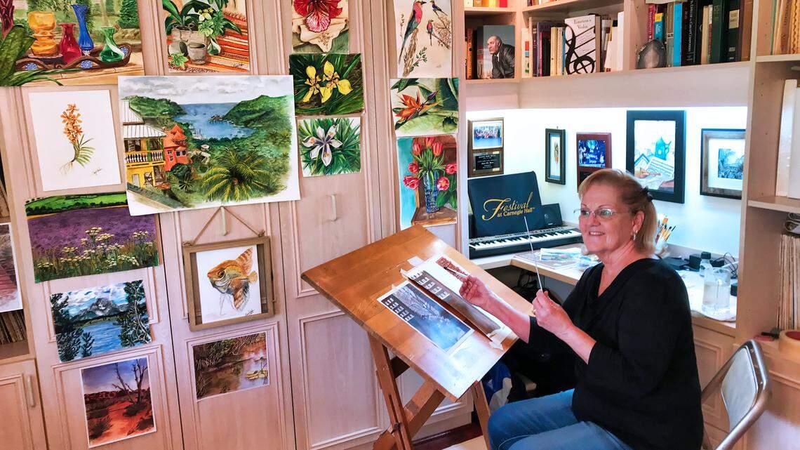 The South Florida Youth Symphony’s Marjorie Hahn, with baton and brush, has turned to her old passion of painting during the COVID-19 pandemic.
