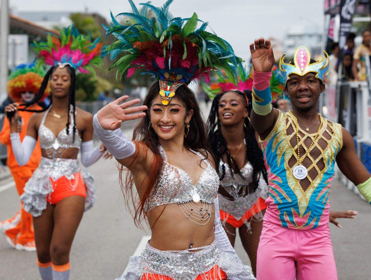 UniverSoul Circus perform during the Dr. Martin Luther King Jr. Day parade on Monday, Jan. 20, 2025, in Liberty City in Miami, Fla.