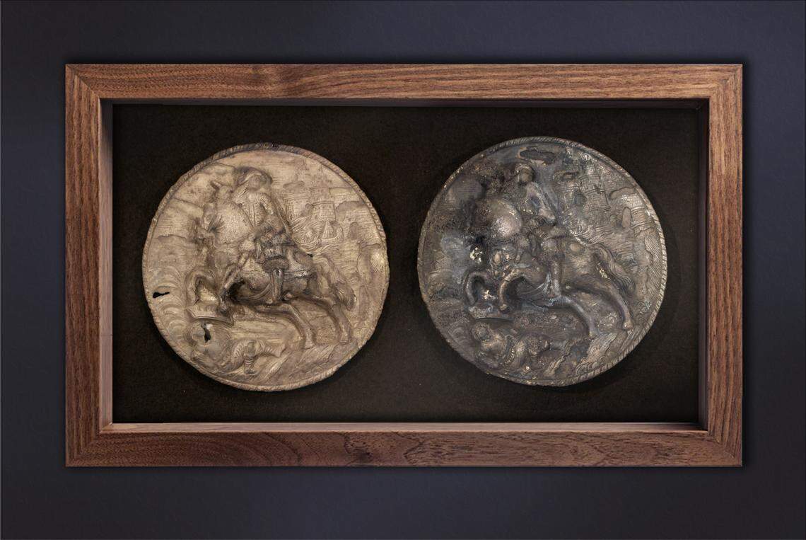 The plates are six inches in diameter, weigh about three quarters of a pound and are embossed with images of a mounted horseman (believed to be St. James), a castle-like structure in the background and a “prone figure surmounted by a crown bearing three crescent moons.”