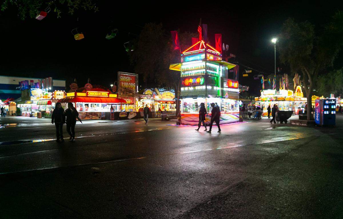 Rides, food and other booths are ready for guests during the opening day of the Miami-Dade County Youth Fair in Miami, Florida on Thursday, November 18, 2021.