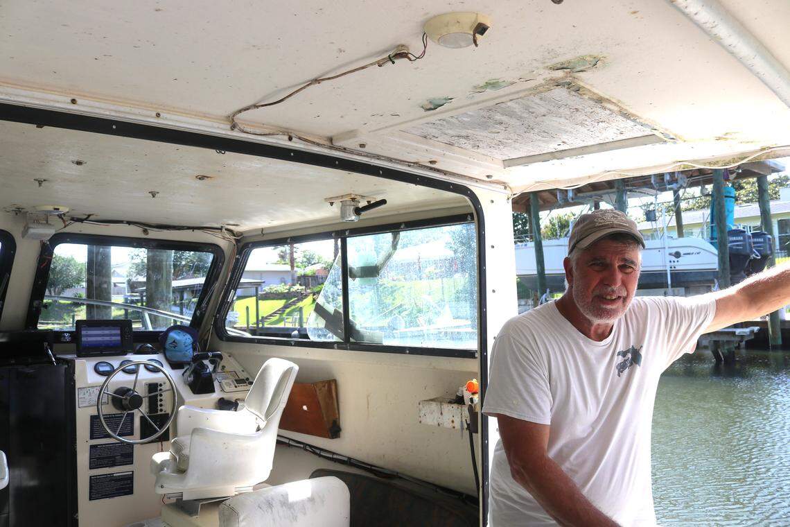 Mark Tryon stands inside his boat “No Nonsense 4” in Pensacola, Florida on Friday, May 16, 2025. Tryon said he’s concerned Manna Fish Farms will overlap with his normal fishing grounds.