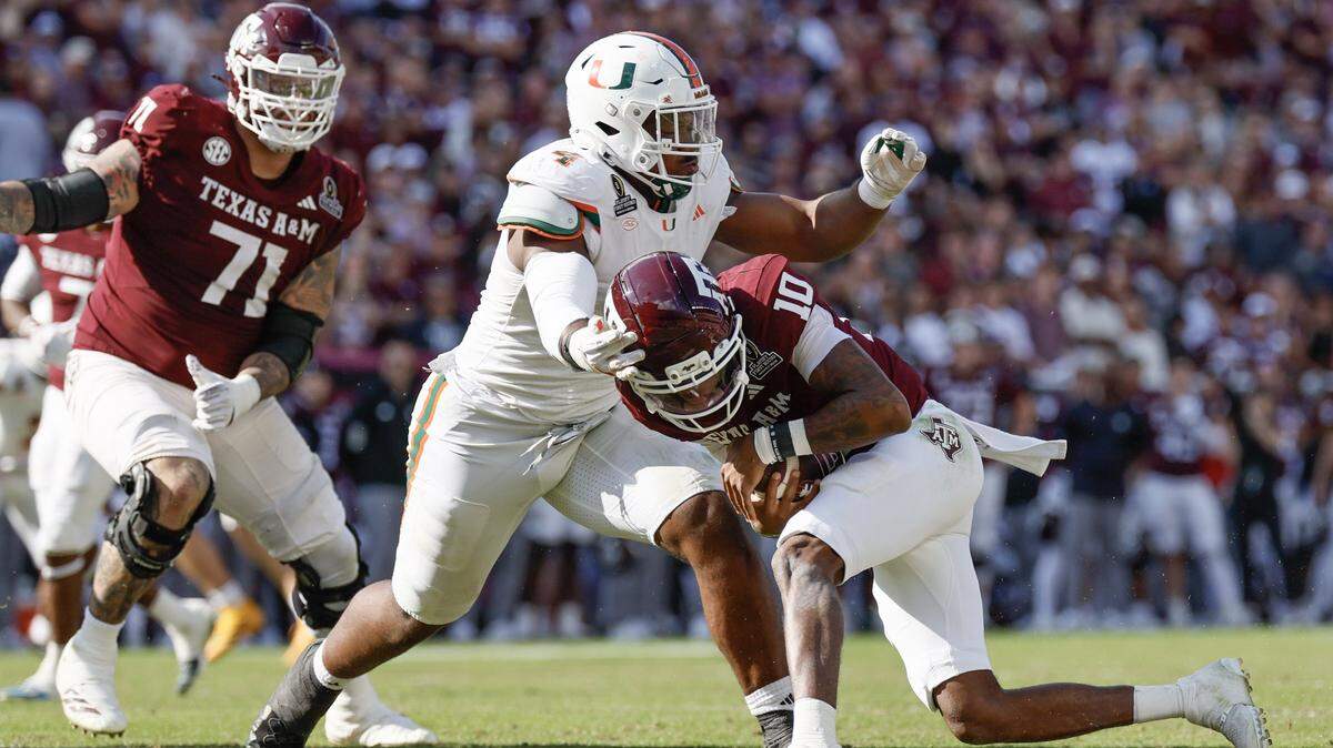 Miami Hurricanes defensive lineman Rueben Bain Jr. (4) sacks Texas A&M Aggies quarterback Marcel Reed (10) in the second half of the first round of the 2025 College Football Playoff at Kyle Field at College Station, Texas, on Saturday, December 20, 2025. 