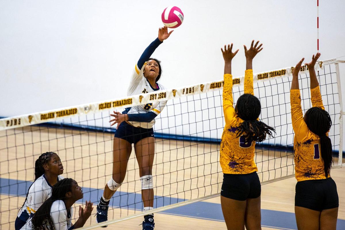 St. Thomas Aquinas outside hitter Zori Brown (6) spikes the ball during the BCAA Big 8 Championship against South Plantation at Pompano Beach High in Pompano Beach, Florida, on Thursday, October 13, 2022.