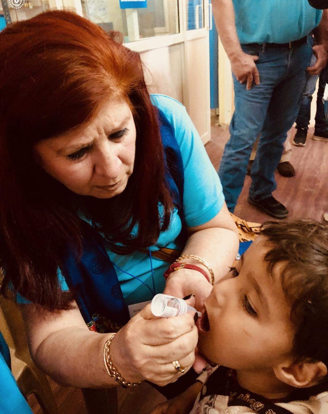 Maria Kesti, a past president of the Rotary Club of Perrine-Cutler Ridge/Palmetto Bay, traveled to India with other Rotarians and staff from the World Health Organization to help administer polio vaccinations to children.