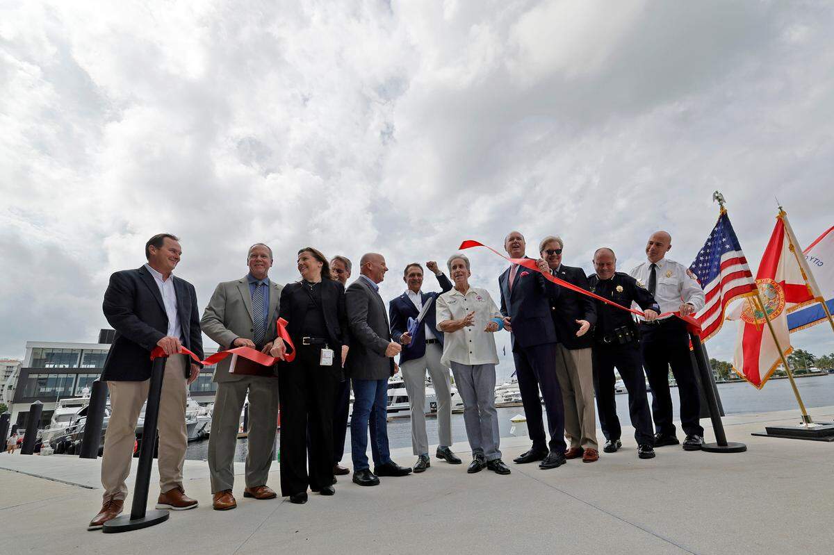 Ft. Lauderdale mayor Dean Trantalis ceremonially cuts the ribbon to celebrate the grand opening of the Las Olas Marina in Fort Lauderdale on Tuesday, Oct. 29, 2024. (Amy Beth Bennett / South Florida Sun Sentinel)