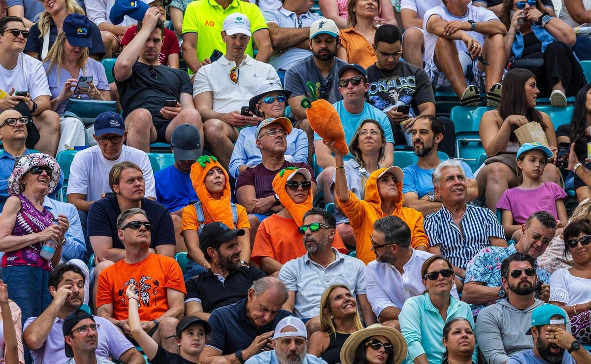 Fans of Jannik Sinner, of Italy dress as carrots as during his match against Daniil Medvedev, of Russia, in the men’s single men’s semifinals at the Miami Open tennis tournament, on Friday, March 29, 2024.