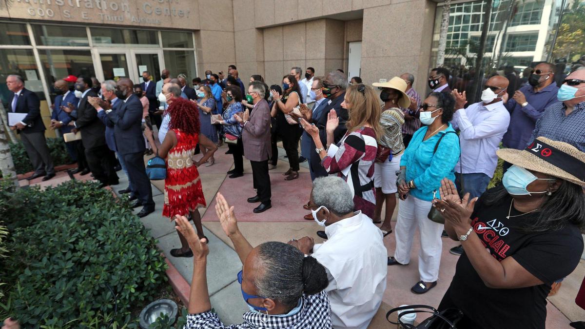 Supporters of Broward Public Schools Superintendent Robert Runcie applaud during a rally held at the Broward County Public Schools Administration building in Fort Lauderdale on Friday, April 23, 2021. Runcie was arrested this week and charged with felony perjury in grand jury proceedings.