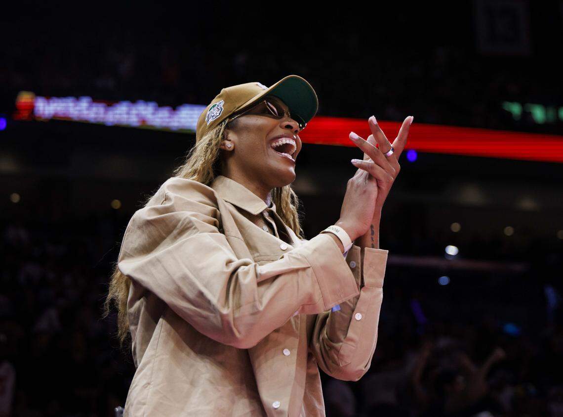 A'ja Wilson, WNBA player, cheers for the Miami Heat and her boyfriend center Bam Adebayo (13) during the second half of a game against the Philadelphia 76ers on Monday, March 30, 2026, at the Kaseya Center in downtown Miami, Fla.