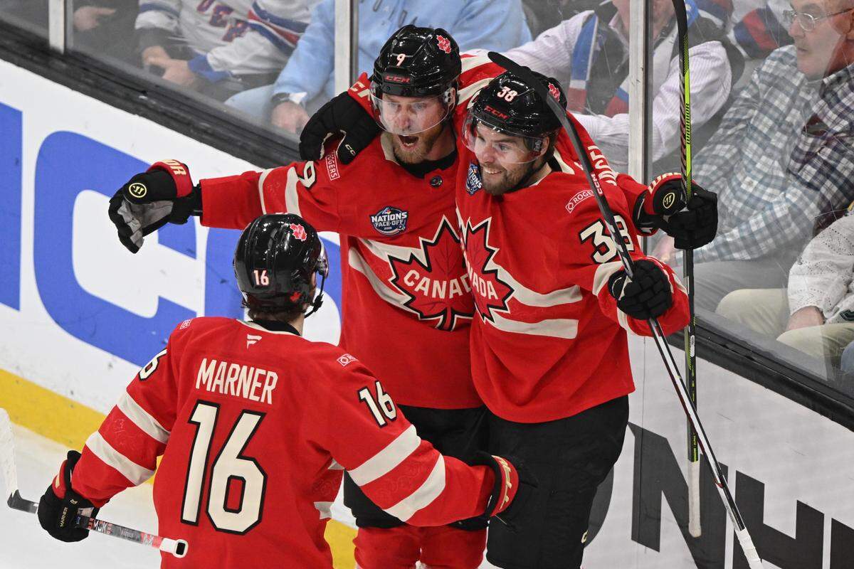 Feb 20, 2025; Boston, MA, USA; Team Canada forward Sam Bennett (9) celebrates scoring with forward Brandon Hagel (38) against Team USA during the second period during the 4 Nations Face-Off ice hockey championship game at TD Garden.