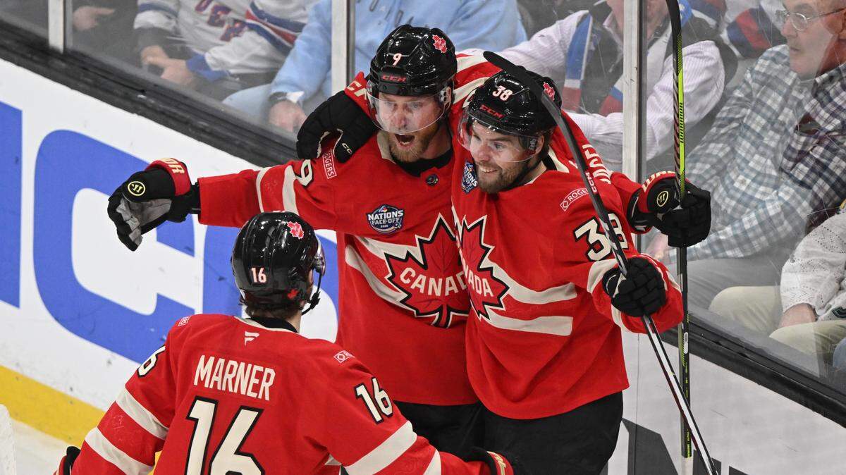 Feb 20, 2025; Boston, MA, USA; Team Canada forward Sam Bennett (9) celebrates scoring with forward Brandon Hagel (38) against Team USA during the second period during the 4 Nations Face-Off ice hockey championship game at TD Garden.