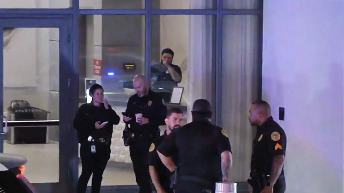 Photo: Miami Herald Police gather at the Solitair Brickell Apartments at Southwest Eighth Street and First Avenue in Miami on Friday, Sept. 4