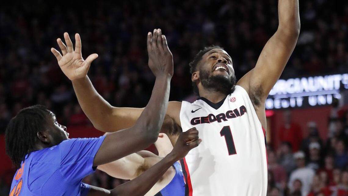 Georgia forward Yante Maten (1) shoots against Florida during the second half of an NCAA college basketball game in Athens, Ga. on Jan. 30, 2018. Maten was selected to the AP All-SEC team on Tuesday, March 6, 2018. (AP Photo/John Bazemore, File)