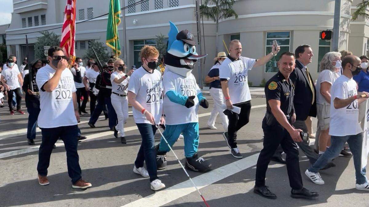 Brown University student Daniel Solomon, to the left of Billy the Marlin, co-teaches the new, full credit course “Blindness, Arts, and Media” at Brown to help bridge the gap between education and inclusivity for the blind.