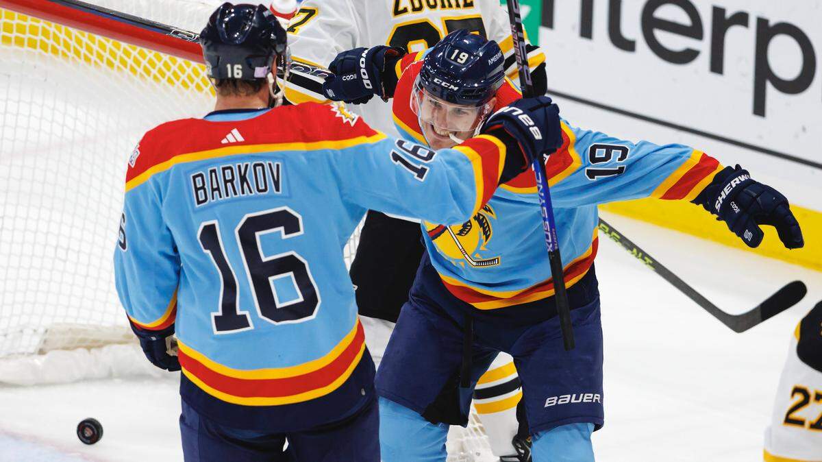Florida Panthers center Aleksander Barkov (16) celebrates with teammate Panthers left wing Matthew Tkachuk (19) after scoring a power play goal during the second period of an NHL game against the Boston Bruins at FLA Live Arena on Wednesday, November 23, 2022 in Sunrise, Fl.