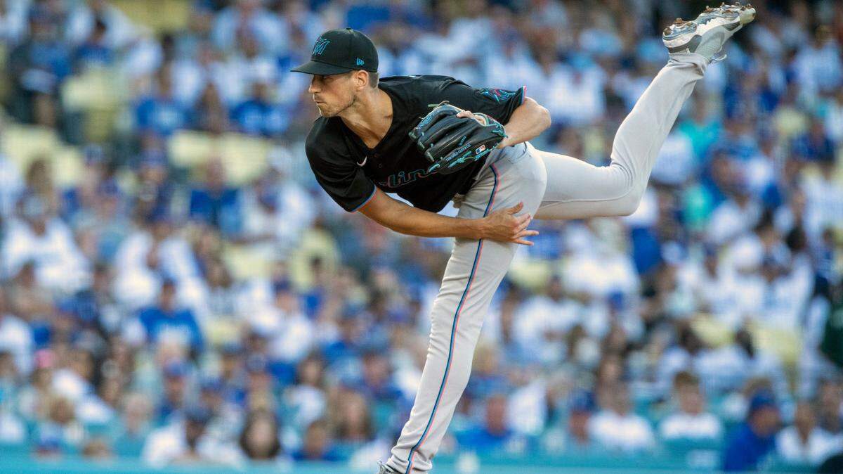 Miami Marlins starting pitcher Bryan Hoeing follows through on a throw to a Los Angeles Dodgers batter during the first inning of a baseball game in Los Angeles, Saturday, Aug. 20, 2022. (AP Photo/Alex Gallardo)