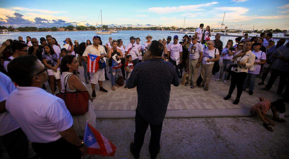 Hundreds gathered in prayer and chant in a candlelight vigil to honor those victims of Hurricane Maria.