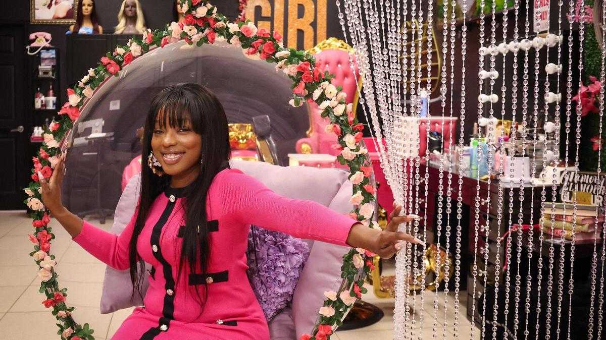 LaDavia Harrell, 29, is the owner of Glamour Girl Galore, a Hialeah women’s hair salon. She’s photographed inside her salon boutique on Jan. 17, 2023.