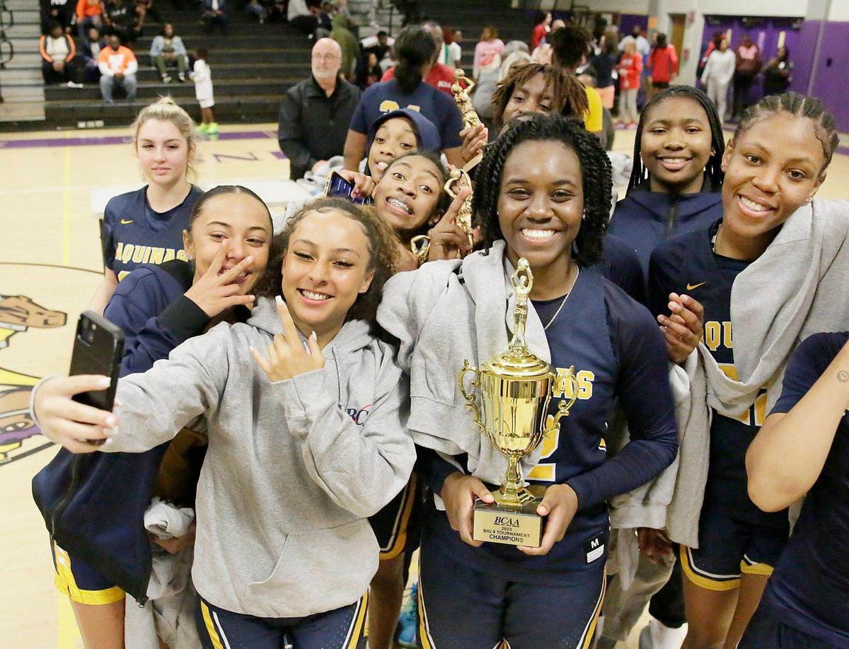 St. Thomas Aquinas Raiders take a selfie after they won the BCAA Big 8 Girls’ 2023 Basketball championship game against Blanche Ely Tigers on Saturday, January 28, 2023 at South Plantation HS in Plantation. Andrew Uloza / for Miami Herald