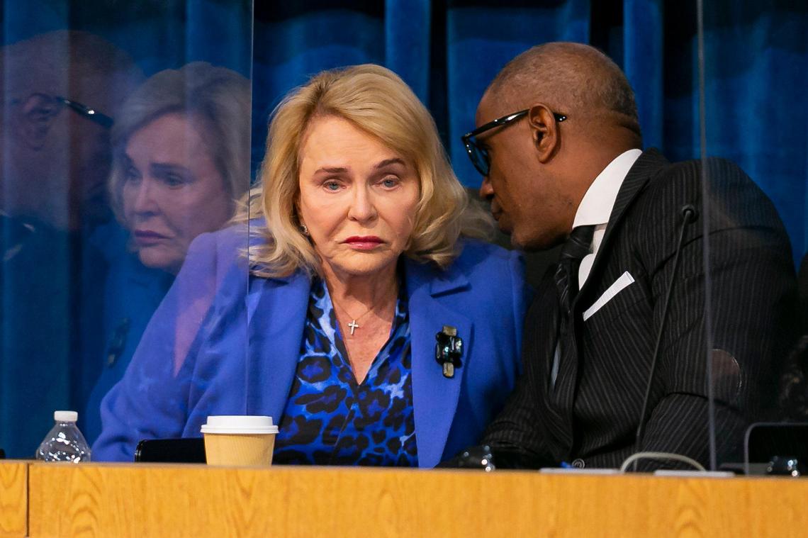 Miami-Dade Public School Board Chair Perla Tabares Hantman, left, listens to Vice Chair Steve Gallon III during a special meeting on Jan. 18. On Wednesday, April 27, Hantman announced she would not seek reelection, after serving on the board since 1996.