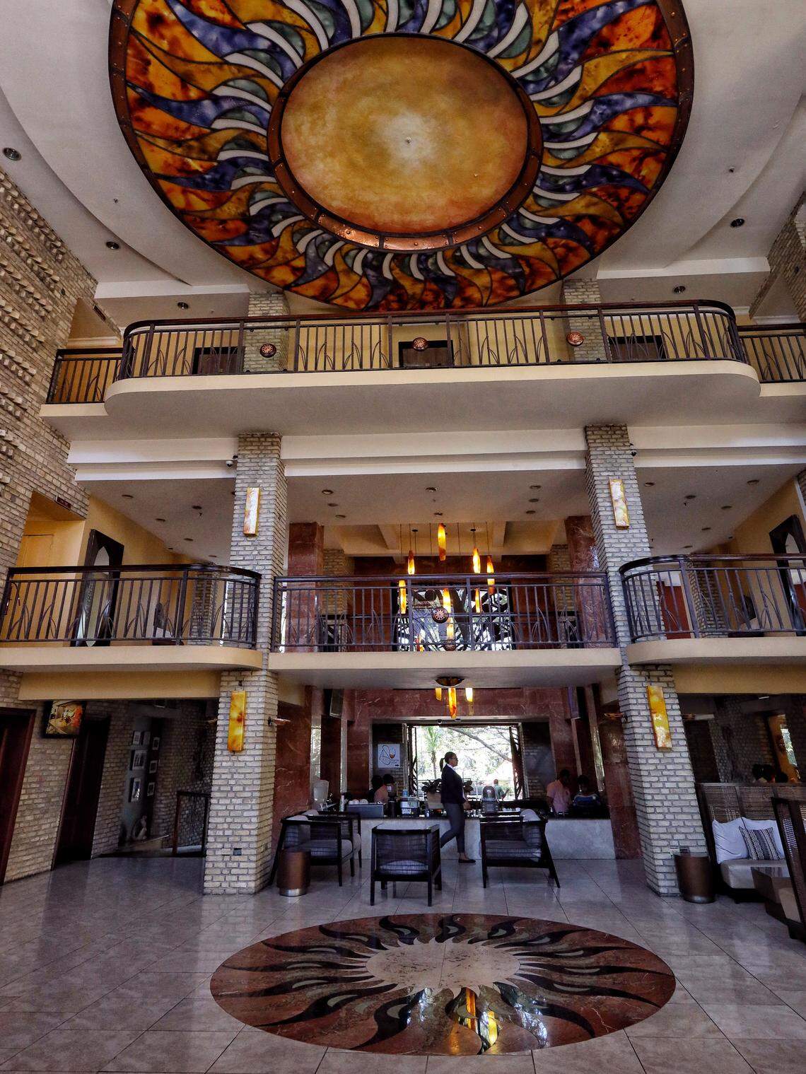 The once-crowded lobby of the Karibe Hotel is now mostly empty even though normal operations have begun to resume in Haiti.