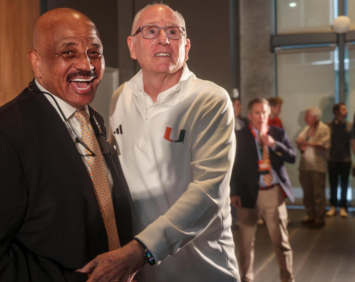 Former NBA star and father of Jai Lucas, John Lucas III, left, shares a moment of happiness while greeting Jim Larrañaga, right, who stepped down on December 26, 2024, after coaching 13-plus seasons at Miami and as Jai Lucas introduction as its new head coach. The University of Miami introduced Jai Lucas as the new head coach of its men’s basketball program, marking a significant move aimed at revitalizing the team and enhancing its competitive edge in college basketball at UM Lakeside Auditorium on Monday, March 10, 2025, in Coral Gables, Florida.