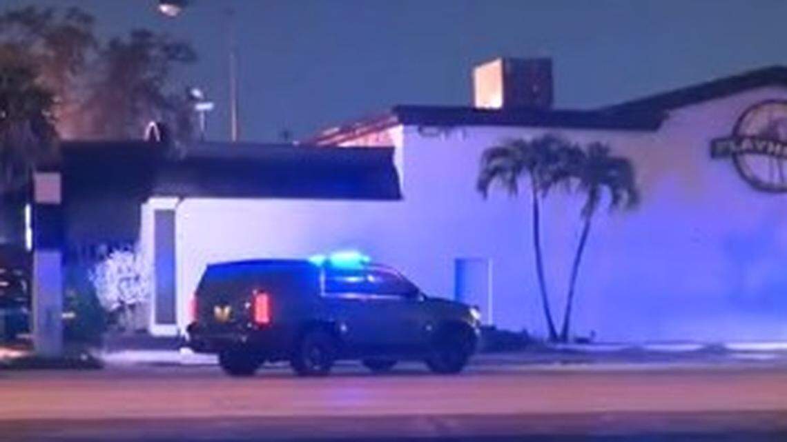 A still shot from Miami Herald news partner CBS 4 Miami shows a Broward Sheriff’s Office SUV outside the Playhouse Gentlemen’s Club in Hallandale Beach Monday morning, Jan. 26, 2026, where a man was shot.