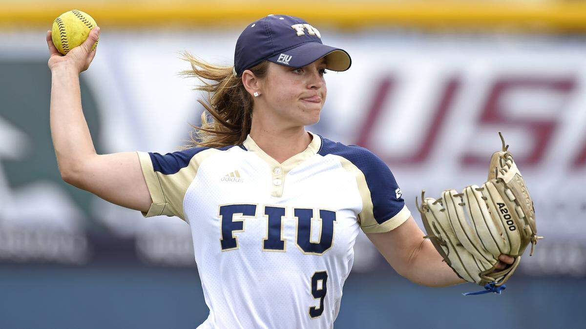 FIU outfielder Jackie Schoff (9) runs through drills prior to a game.