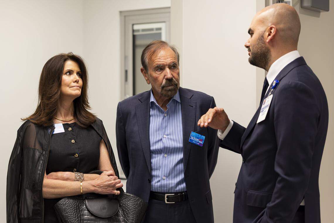 Oscar Betancourt, far-right, chief operating officer at Jackson Memorial Hospital, gives Darlene M. Boytell-Pérez and her husband, Jorge Perez, chairman and chief executive officer of The Related Group, a tour of a new emergency room at Jackson Memorial Hospital on Thursday, April 16, 2026, in Miami, Fla.