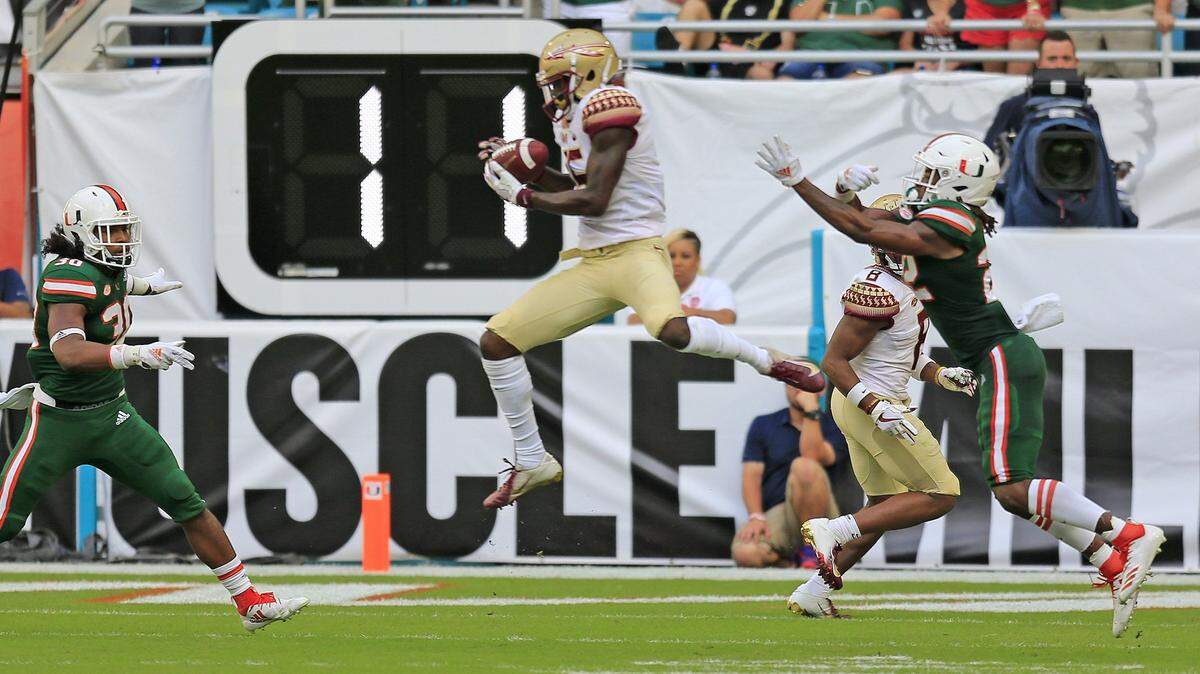 Florida State Seminoles wide receiver Tamorrion Terry (15) scores a touchdown in the second quarter as the University of Miami host Florida State University at hards Rock Stadium in Miami Gardens on Saturday, October 6, 2018.