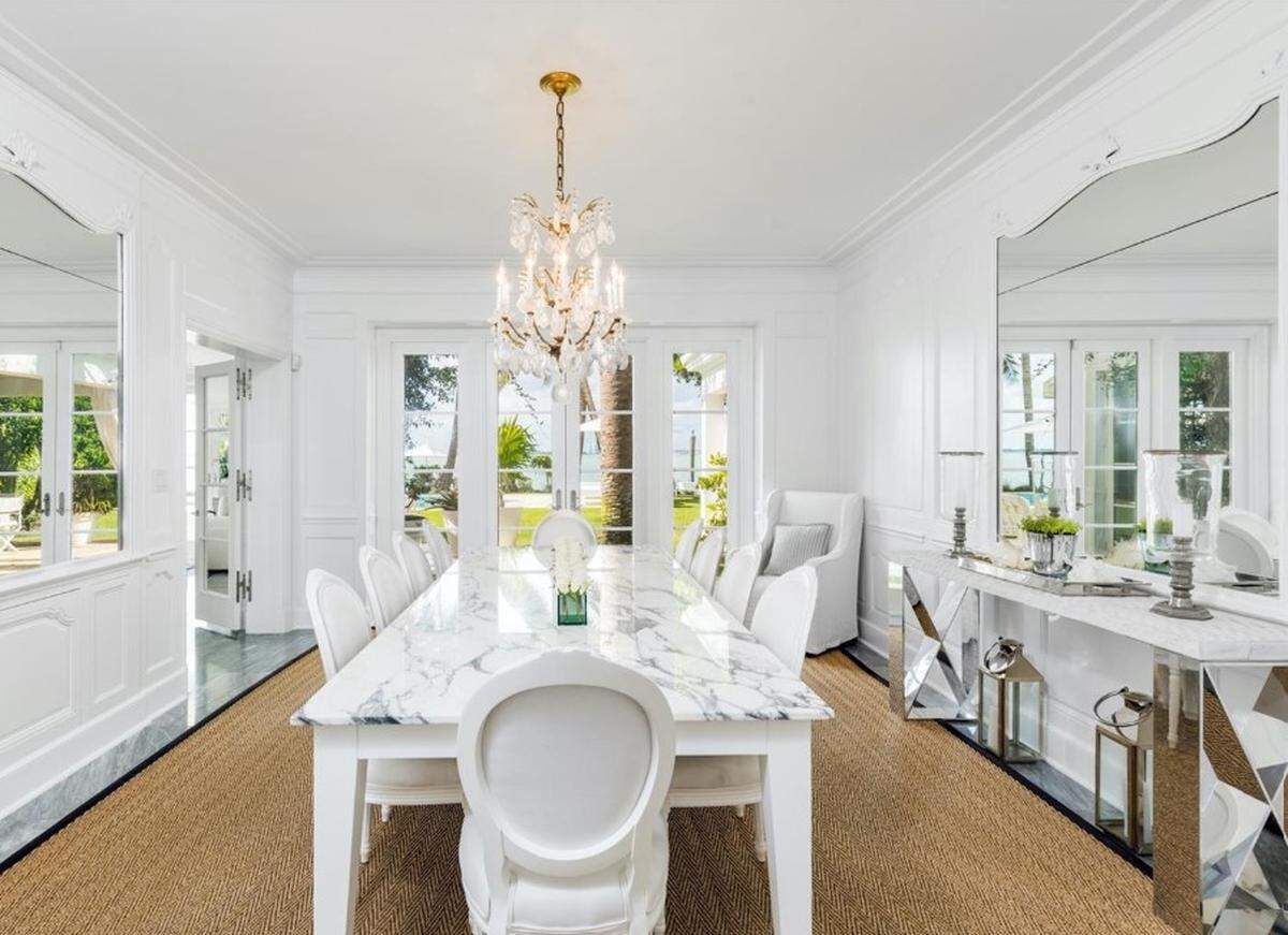 This is a dining area in J. Christopher Burch’s Miami Beach home after he bought it in February 2020.